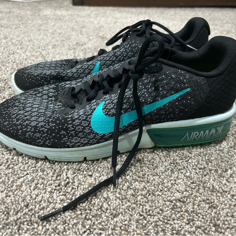 Teal Nike women’s tennis shoes size 11
